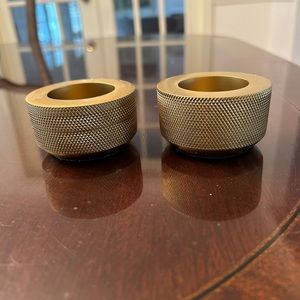 2 knurled gold tea light holders from CB2. Textured.